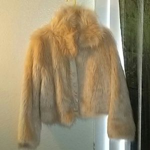 Tan fur coat.